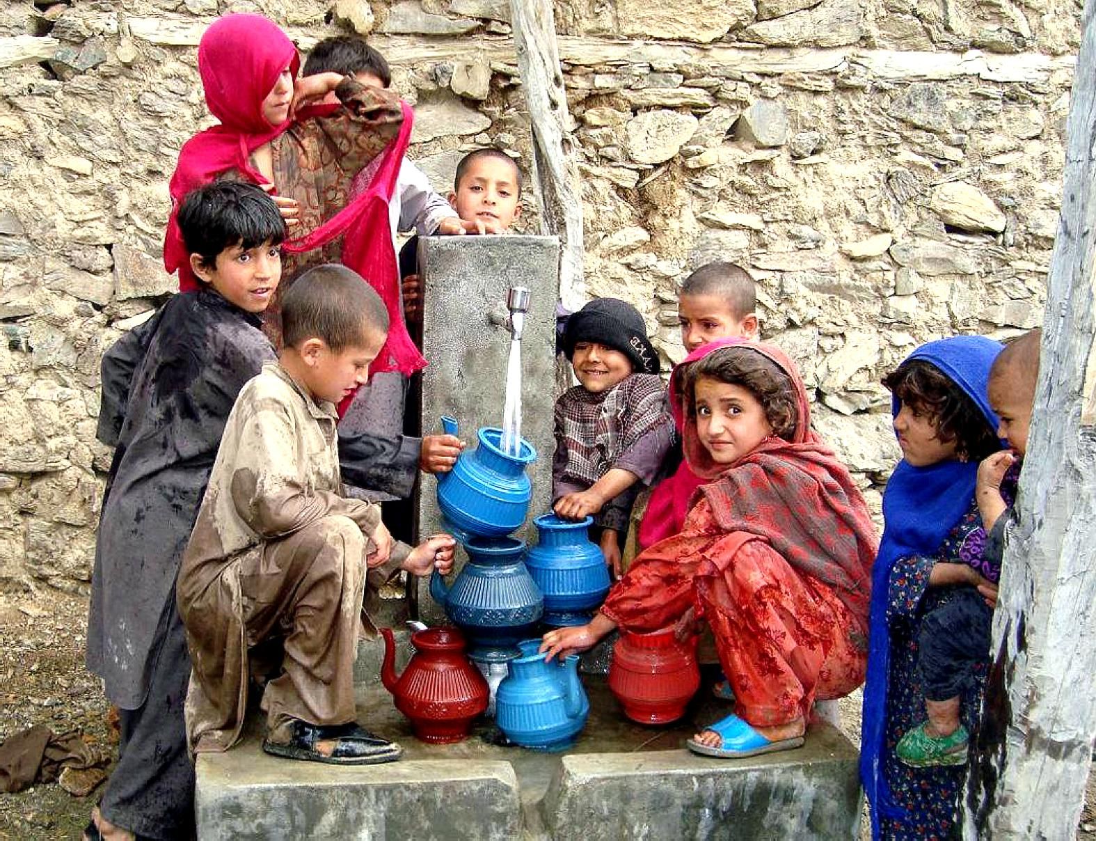 Children accessing clean water in a community project
